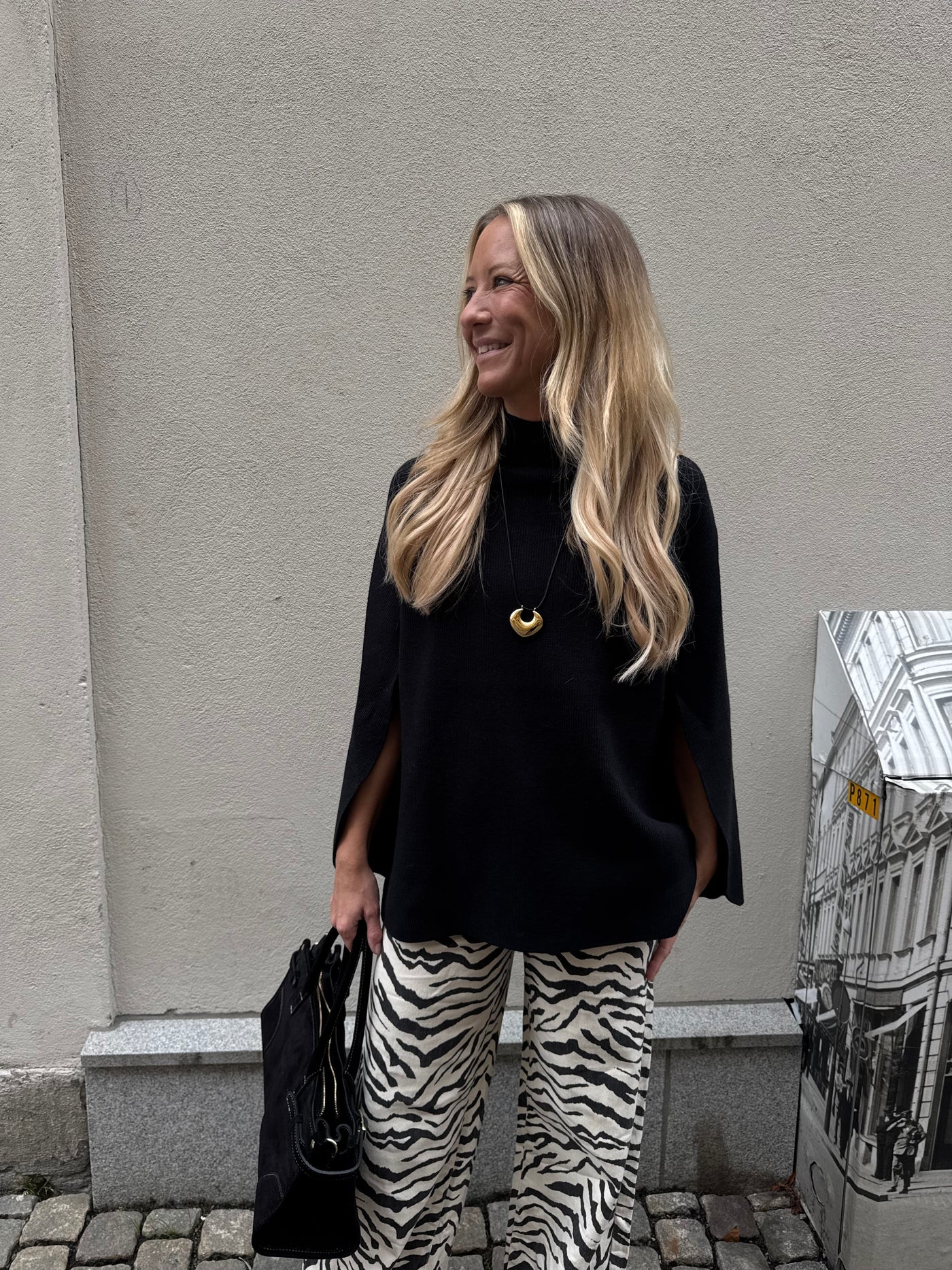 sierra cape tröja Svart