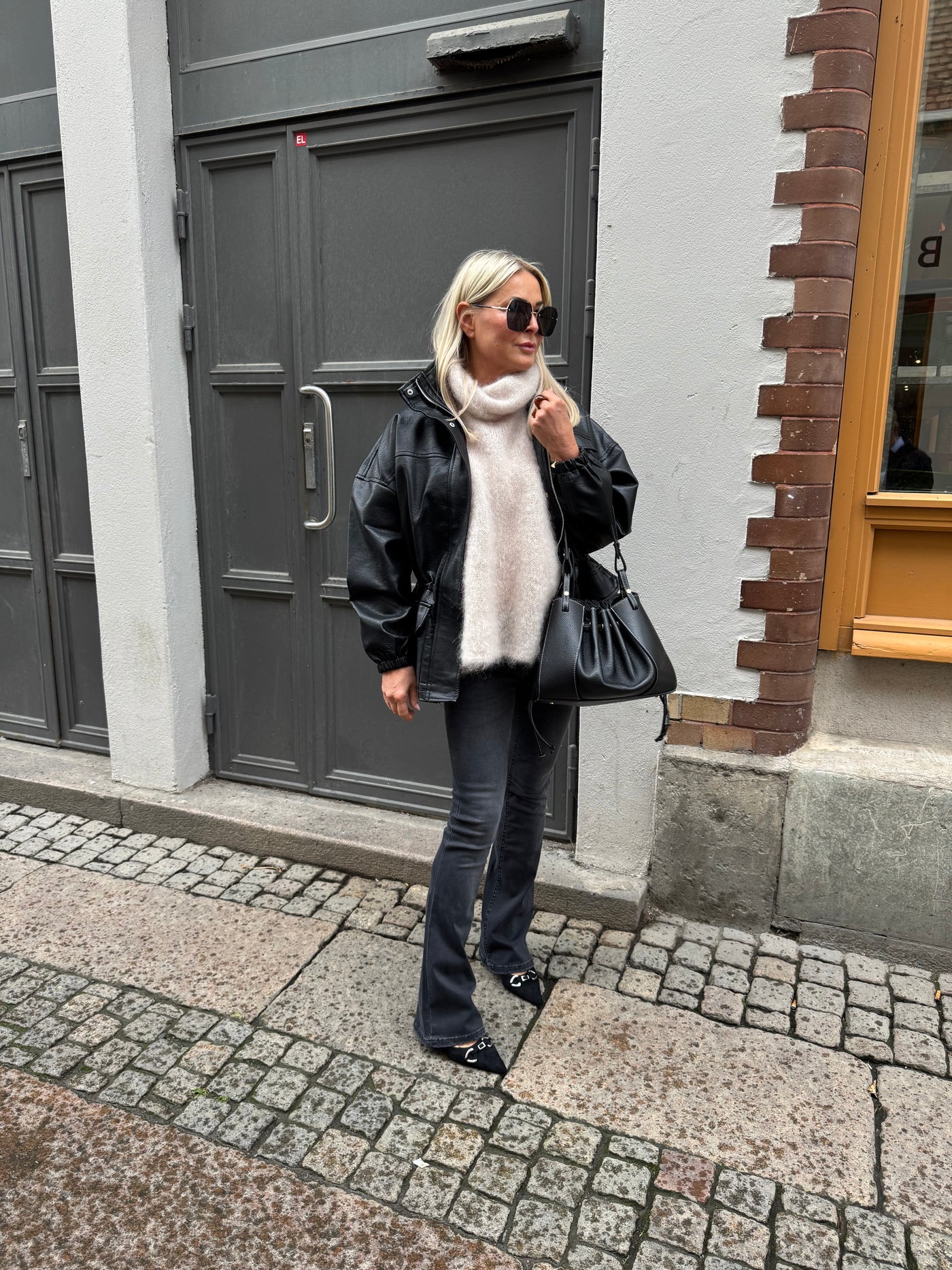 Black leather trench