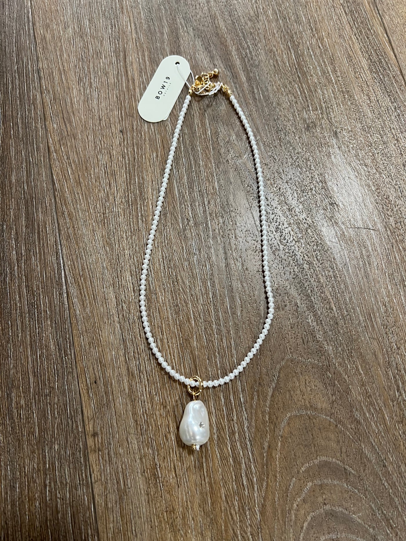 Bow Mini pärlor med stor pärla