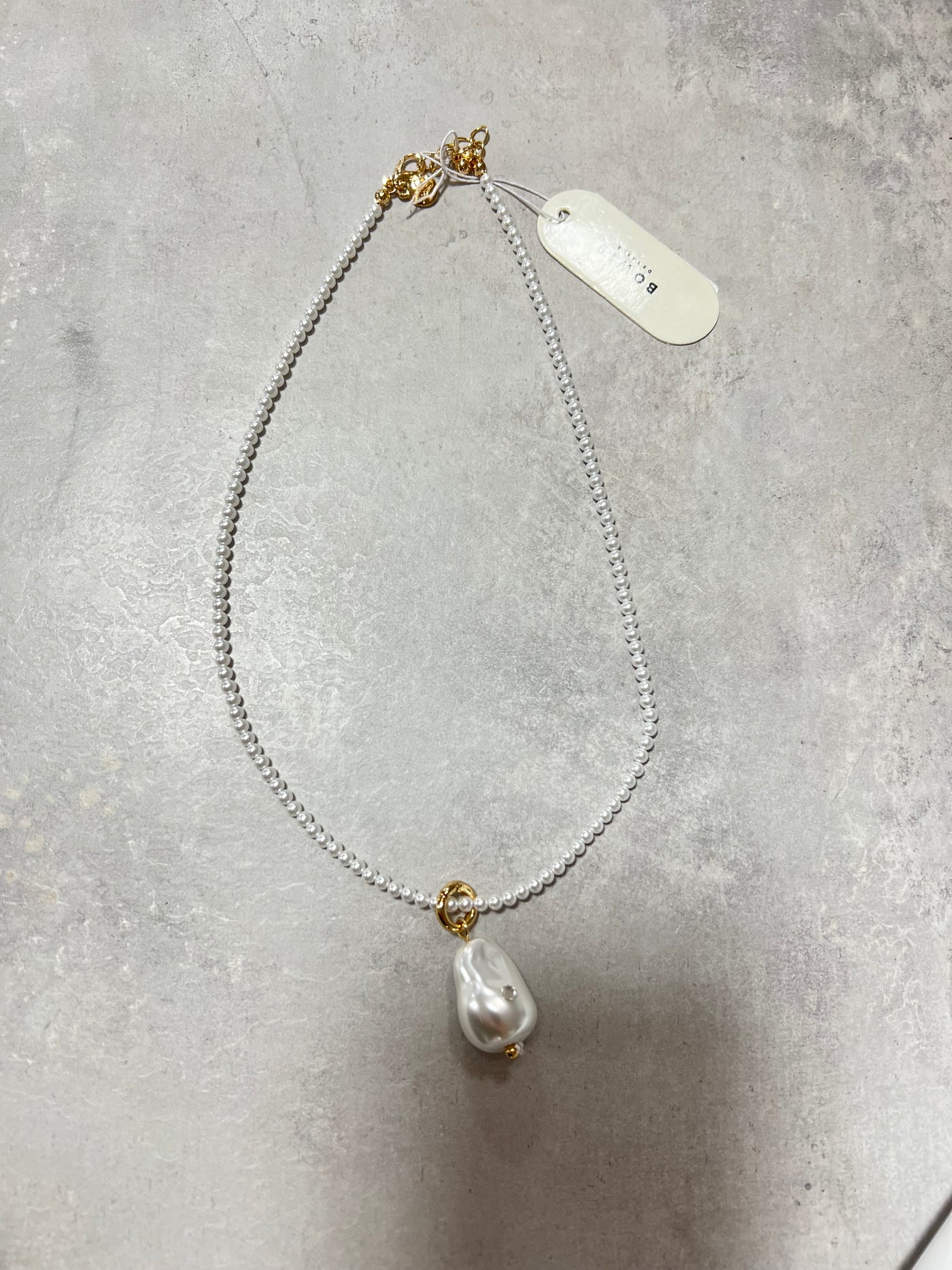 Bow Mini pärlor med stor pärla