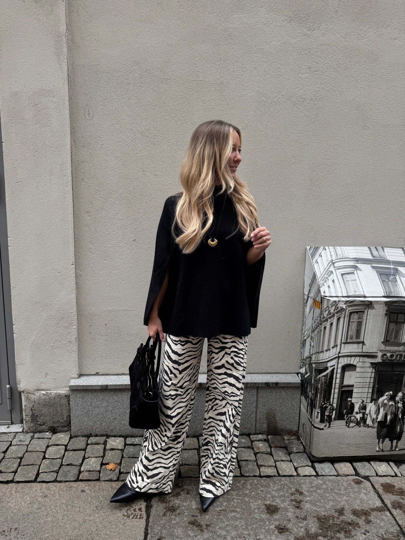 sierra cape tröja Svart